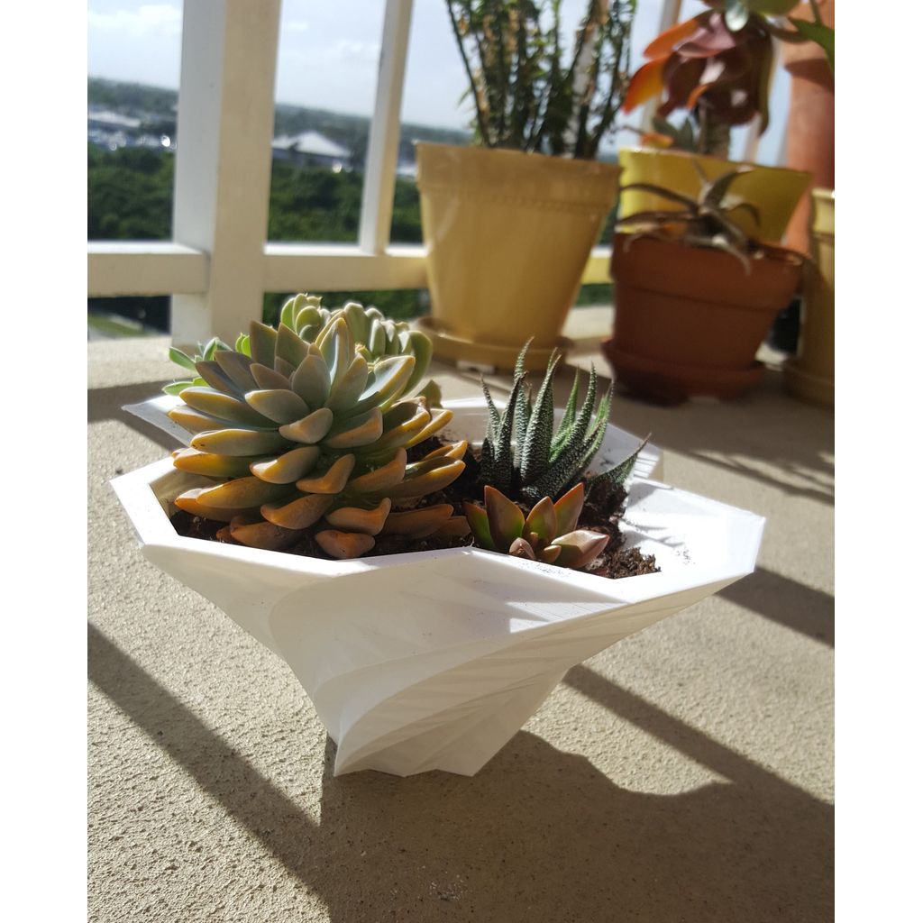 Vaso plantador geométrico