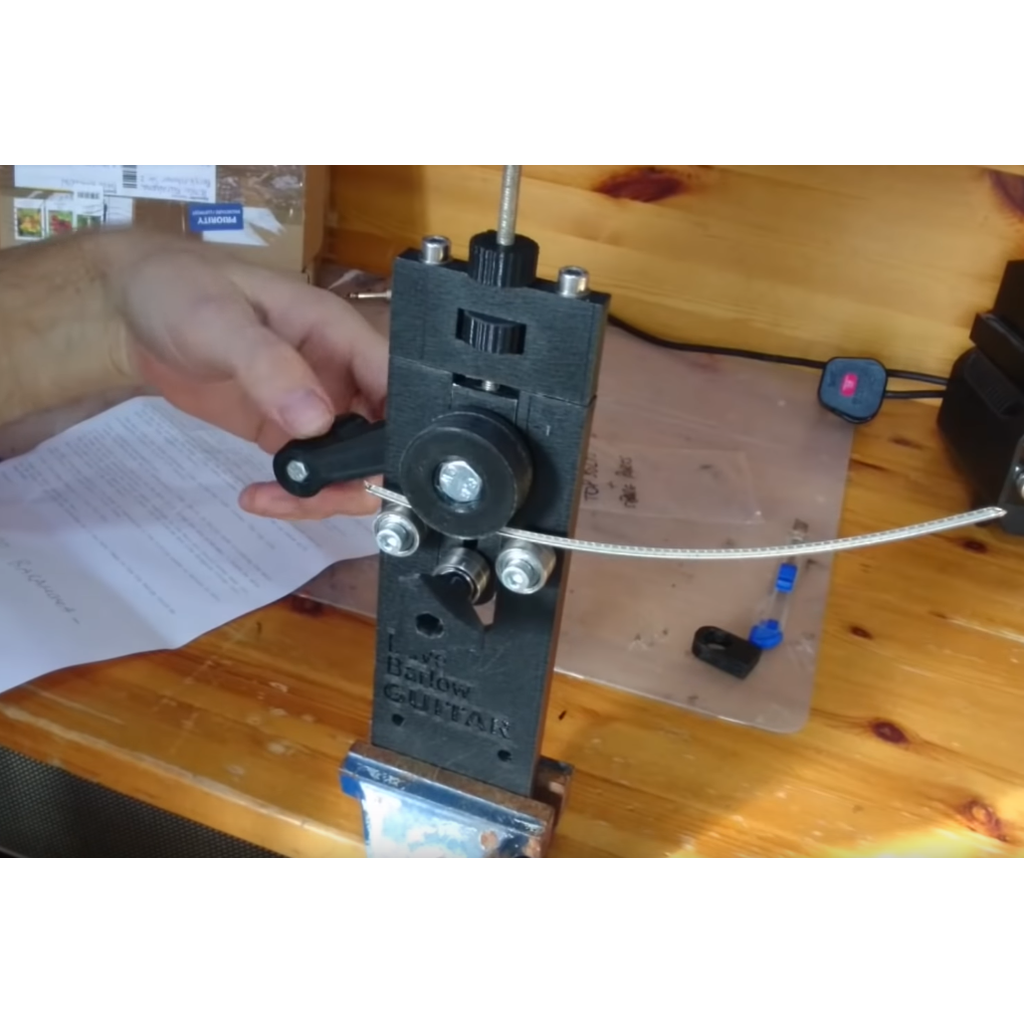 Dobrador de fio para traste de guitarra