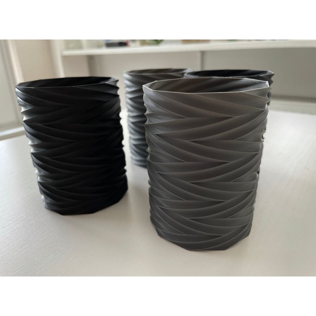 suporte cilíndrico impresso em 3D com textura espiral