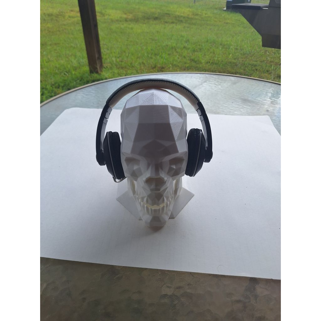 suporte de fone de ouvido de caveira