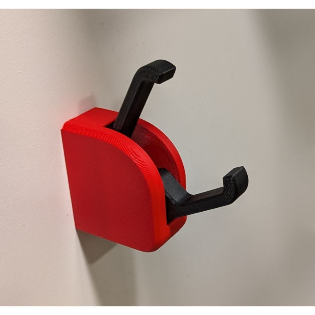 Gancho de parede impresso 3D com pinça articulada