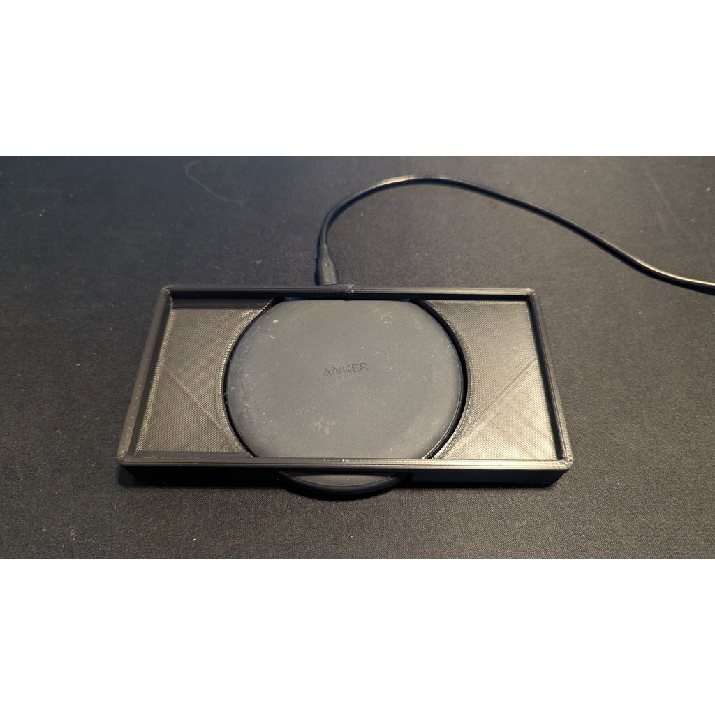 Simple Android phone docking holder for pixel 7 with an Anker charging pad with OpenSCAD customizer